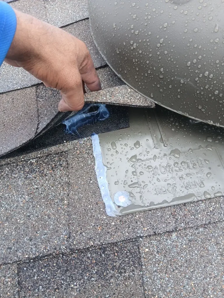New architectural shingle roof with new pipe vents on a two-story home in Uhland, TX after hail damage roof replacement